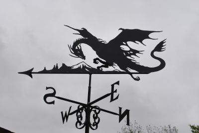 Dragon with mountain weather vane